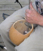 sanding the inside of gourd